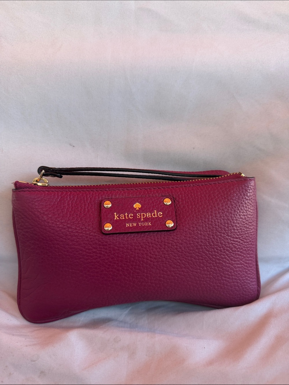 kate spade magenta pebbled leather wristlet clutch